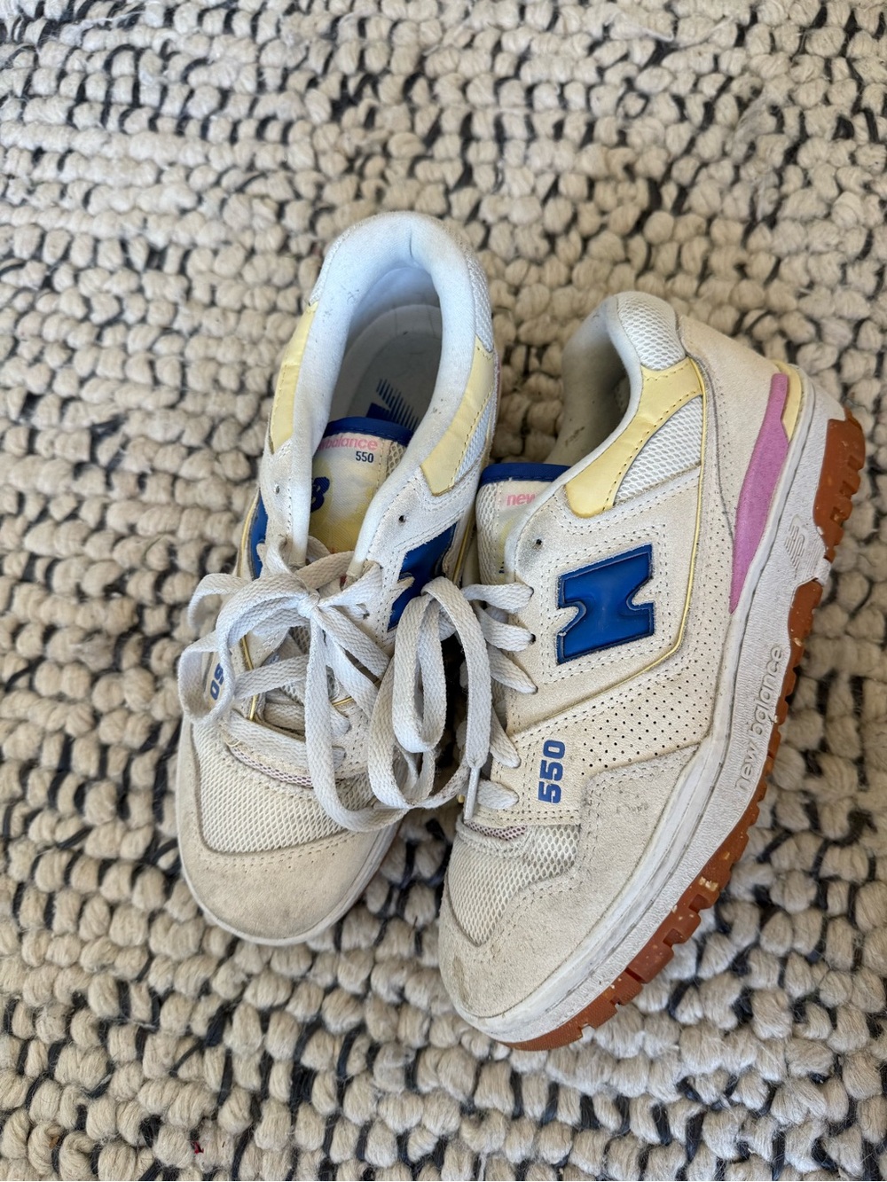 New Balance Women's 550 Sneakers in White with Blue, Yellow, Pink Accents